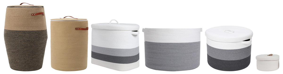 All six Cottonphant shapes photographed on a white background and shown together at true relative scale: each basket scaled to its real measured height, from the 26 inch tall flagon down to the 13 inch nesting set